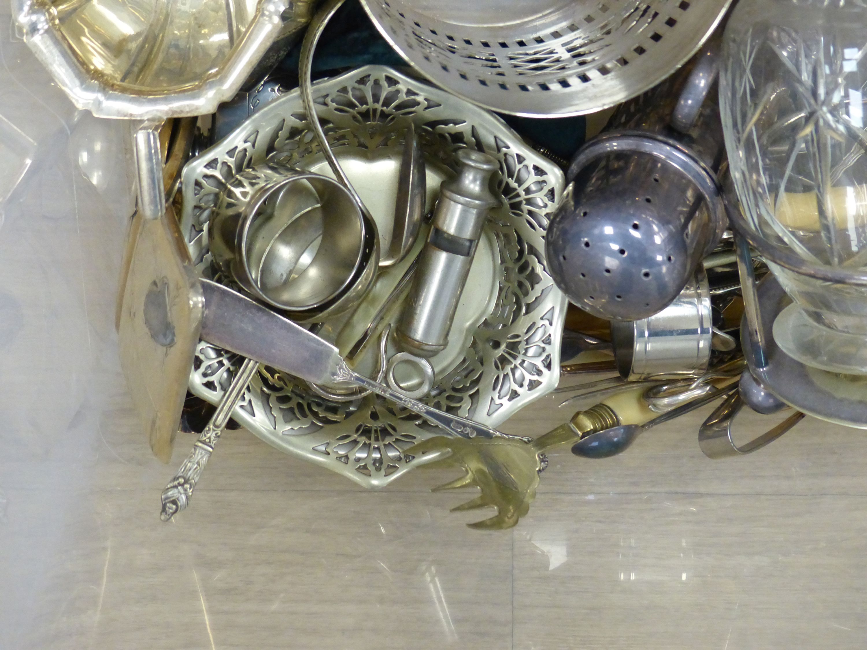 A four-piece silver-plated tea service, a plated ball-shaped string holder, a pair of fish servers etc.